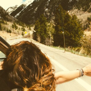 happy woman enjoying car drive