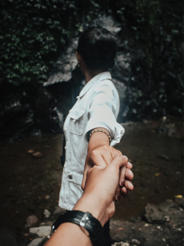 man-holding-woman-hand