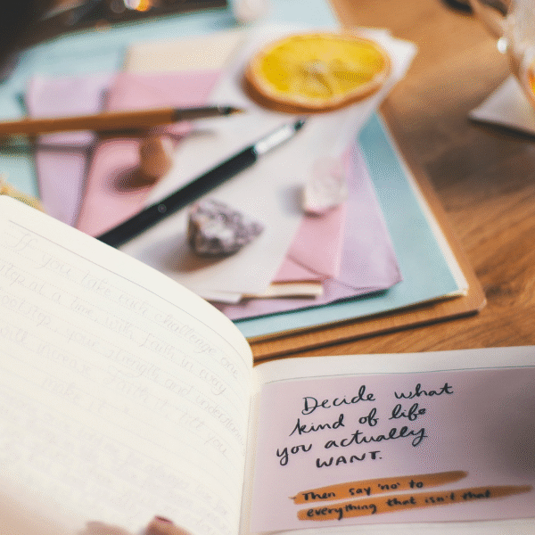 woman-looking-at-a-notebook