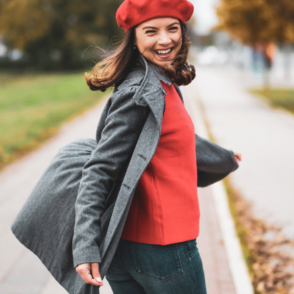 joyful-woman-with-a-red-cap