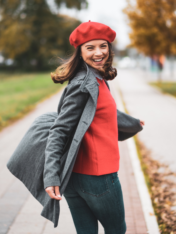joyful-woman-with-a-red-cap