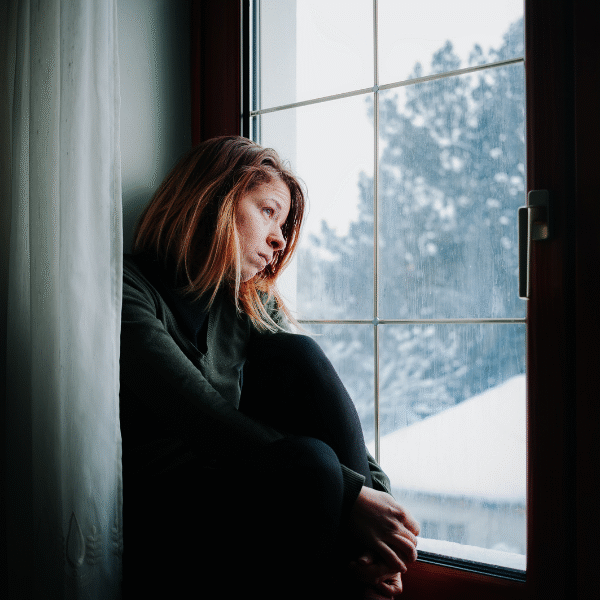 sad-woman-looking-at-the-window
