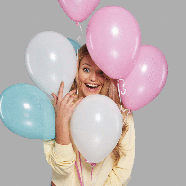 happy-woman-between-balloons