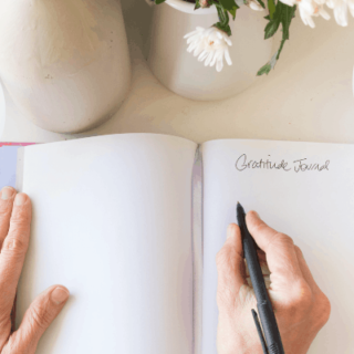woman-writing-in-a-journal