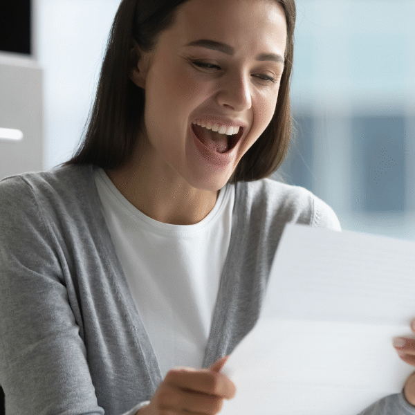 woman-happy-for-paying-bills