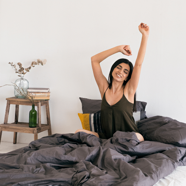 woman-stretching-in-bed