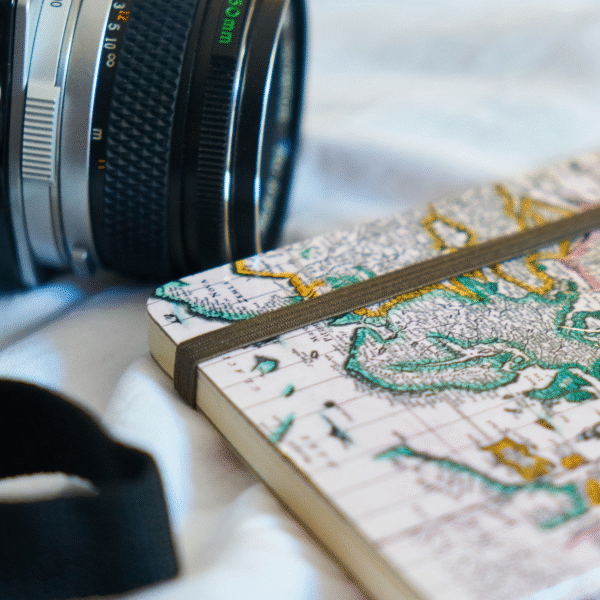 a-travel-notebook-and-a-camera