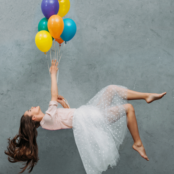 womna-being-pulled-by-some-balloons
