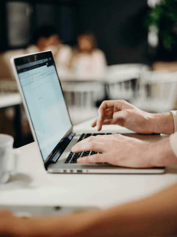hands-typing-on-laptop