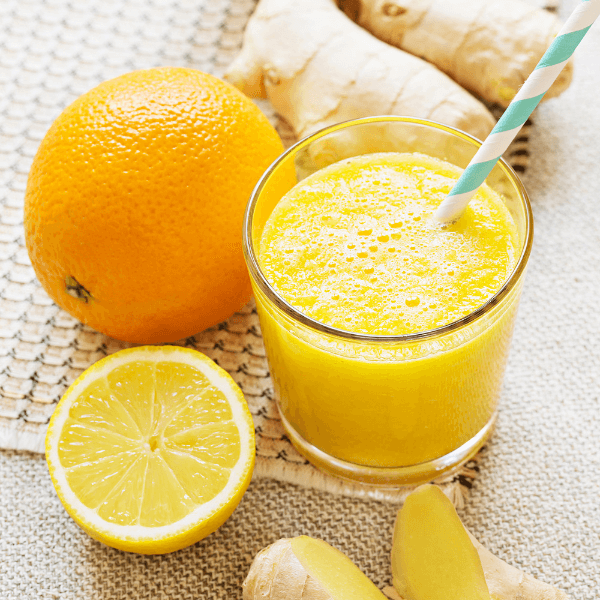 glass-of-orange-juice-on-a-table