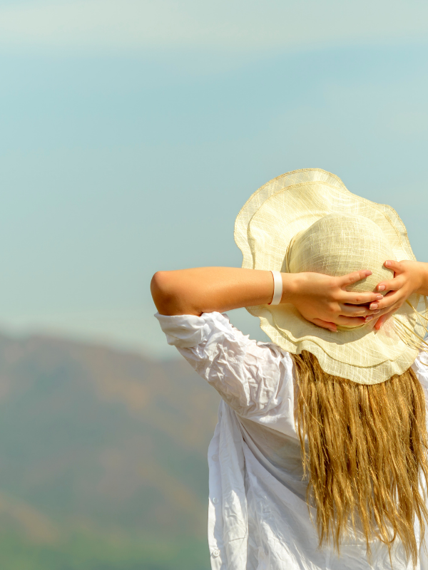carefree woman saying affirmations for self care