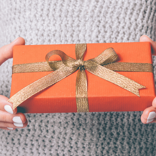 woman holding a meaningful gift