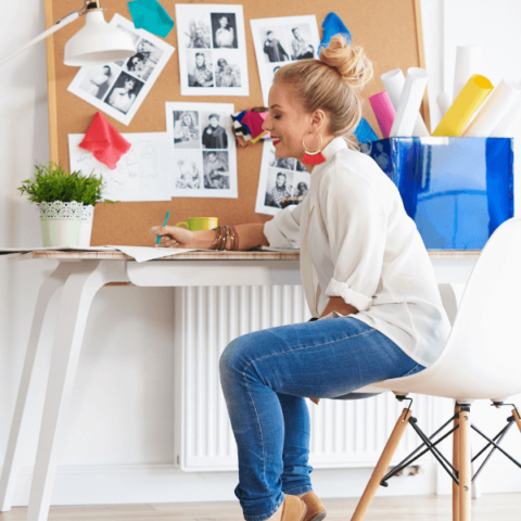 woman-sitting-on-a-desk