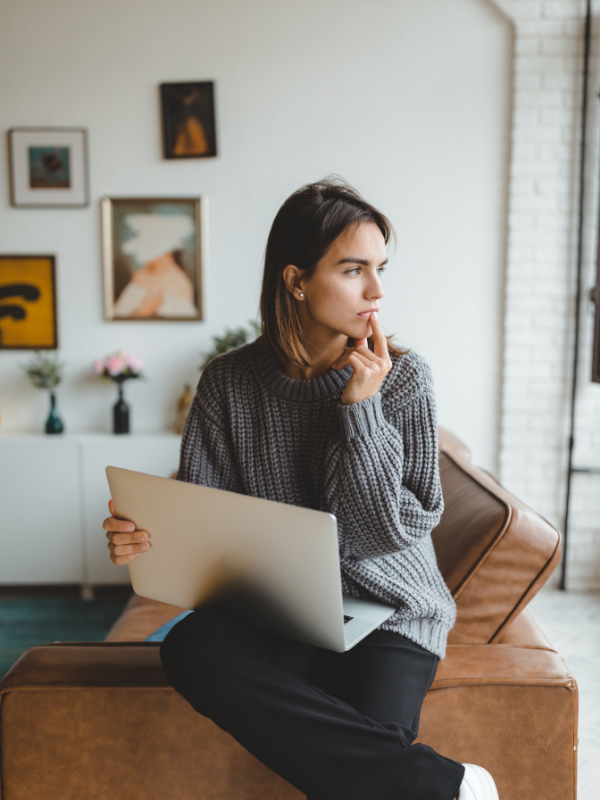 woman thinking of how to save money