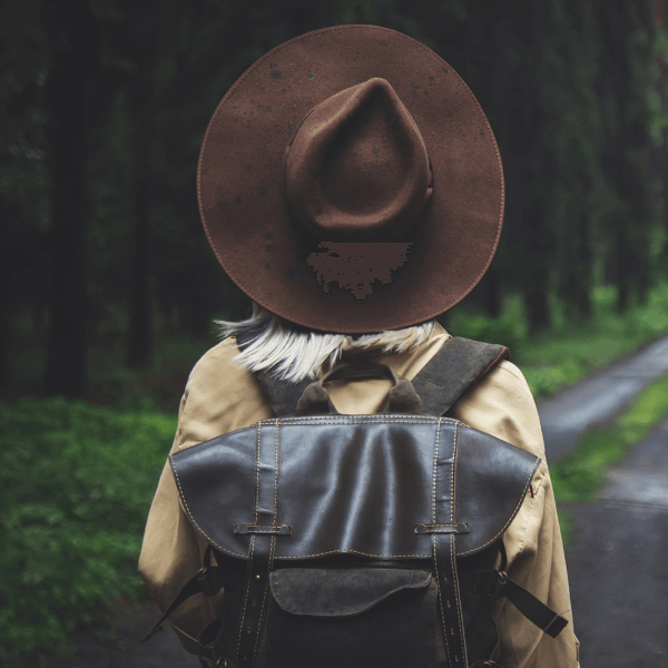 woman-back-wearing-a-brown-hat