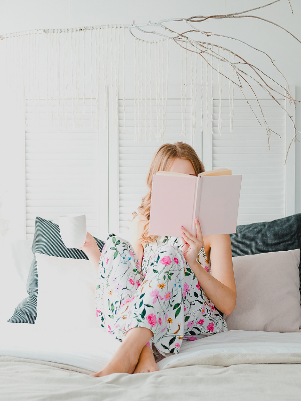 woman reading in bed