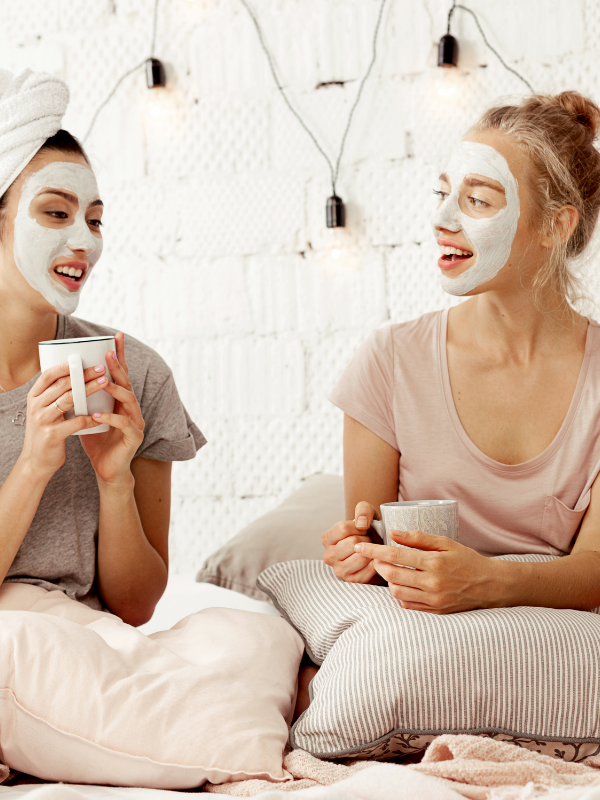friends with face masks chatting