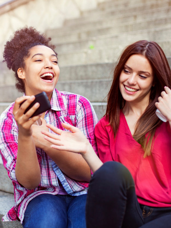 two friends laughing together