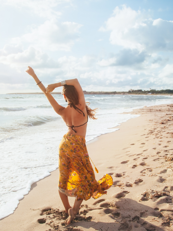 woman walking on the beach