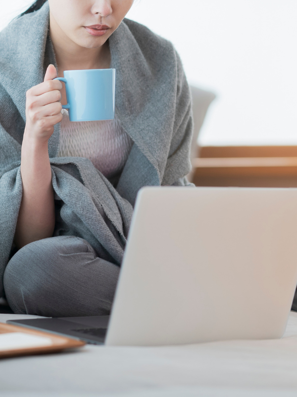 working with mug in hand