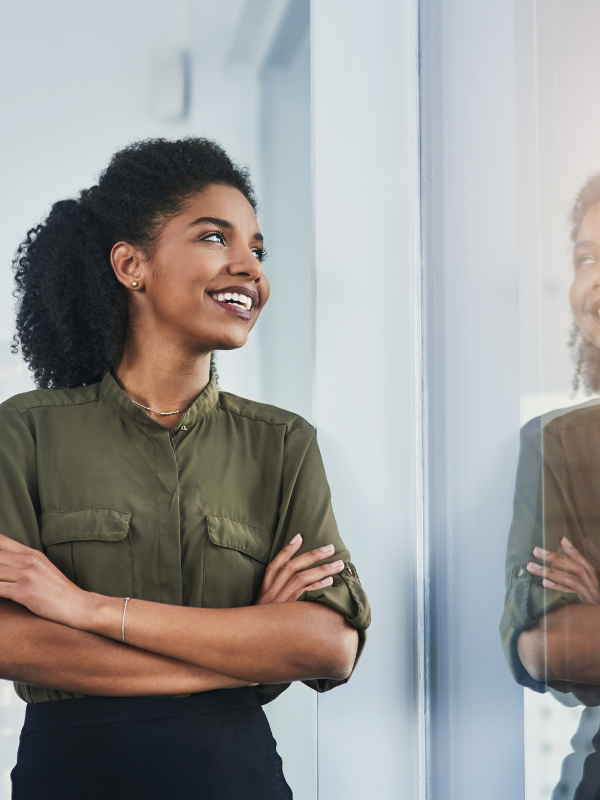 confident woman looking at her reflection