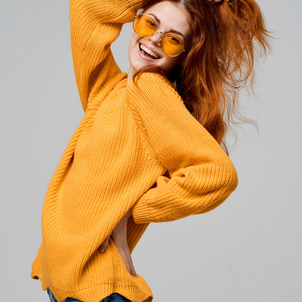 smiling young woman with sunglasses