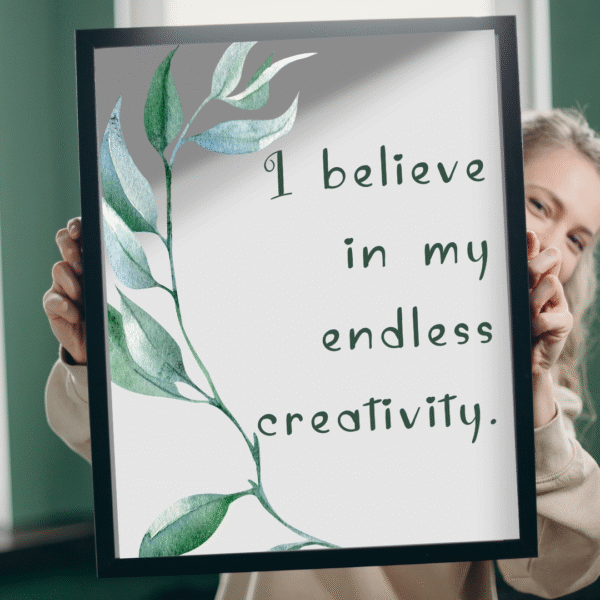 woman holding a picture frame with wall art printed