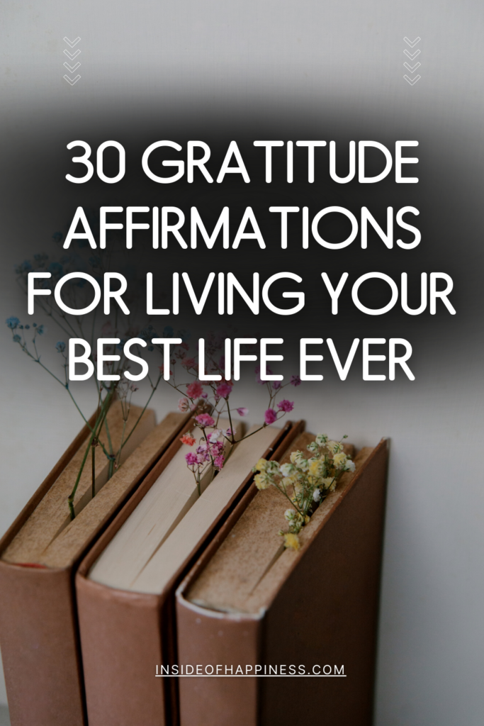 pin image of three books with flowers for bookmarks and text 30 gratitude affirmations for living your best life