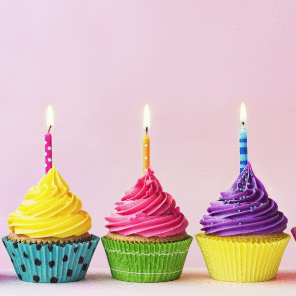 a photo of birthday cupcakes in various colors