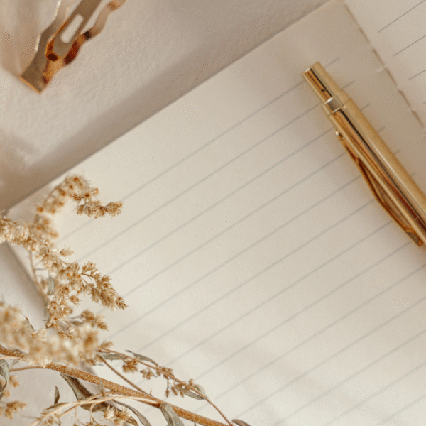 featured image of an open notebook and a pen in aesthetic setting