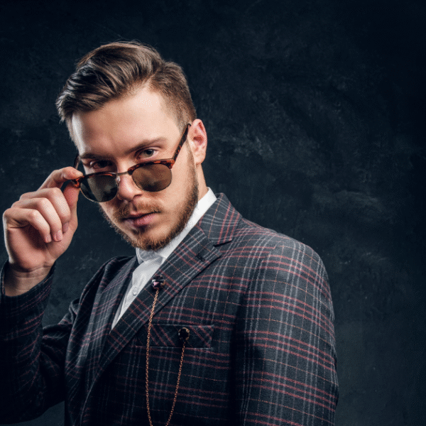 featured photo of a successful looking man with sunglasses for post millionaire mindset quotes